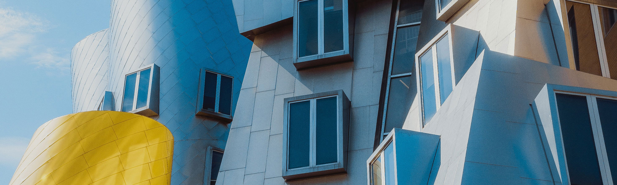 Angled windows in MIT building. Photo by Meriç Dağlı on Unsplash