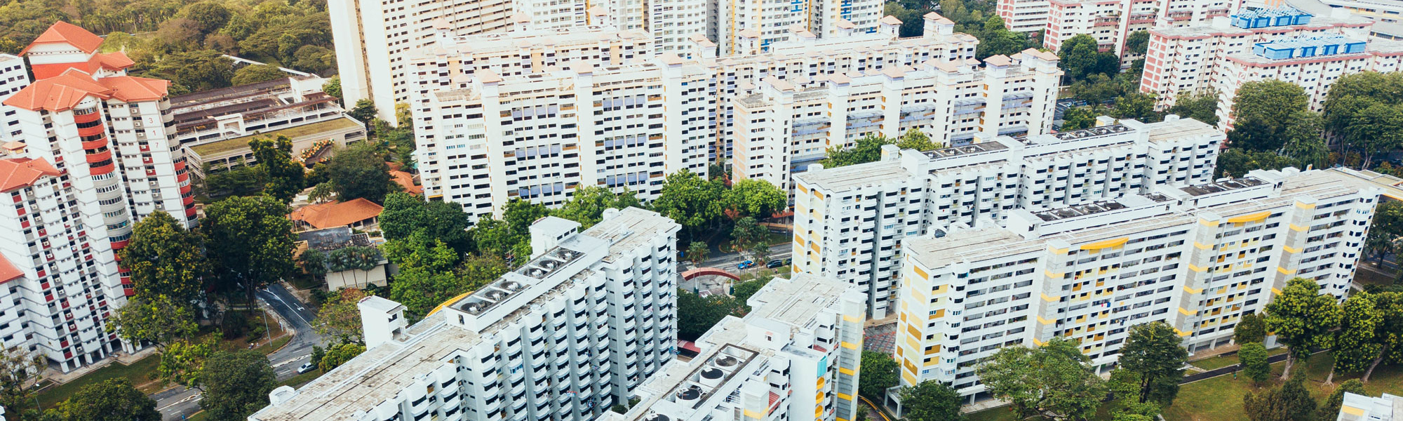Apartment blocks Photo by chuttersnap on Unsplash