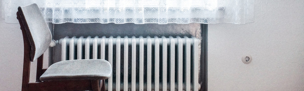 Old fashioned radiator. Photo by Dominik Kuhn on Unsplash