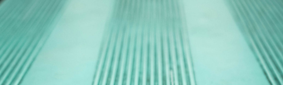 Green pavement Photo by Hannah Troupe on Unsplash