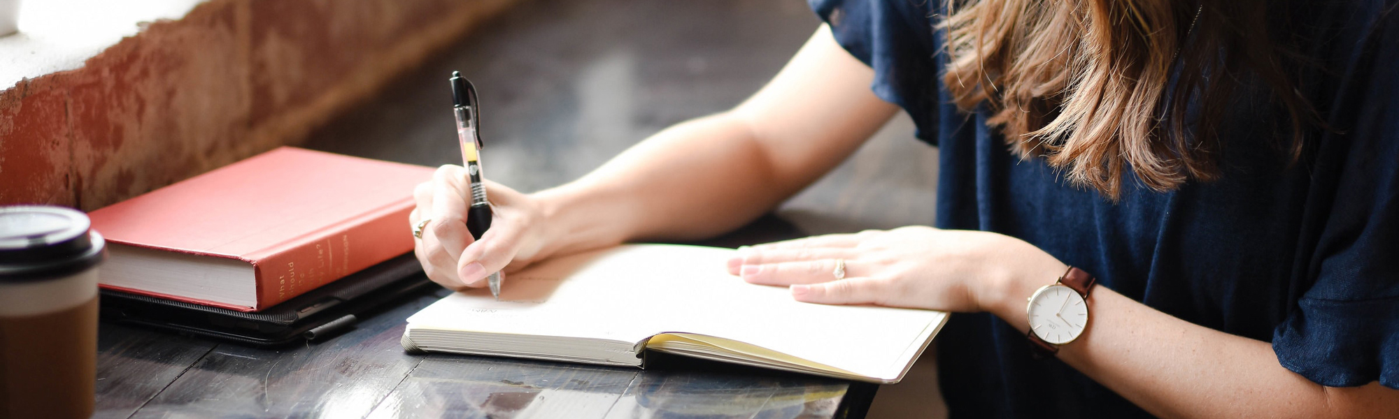 Young woman writing
