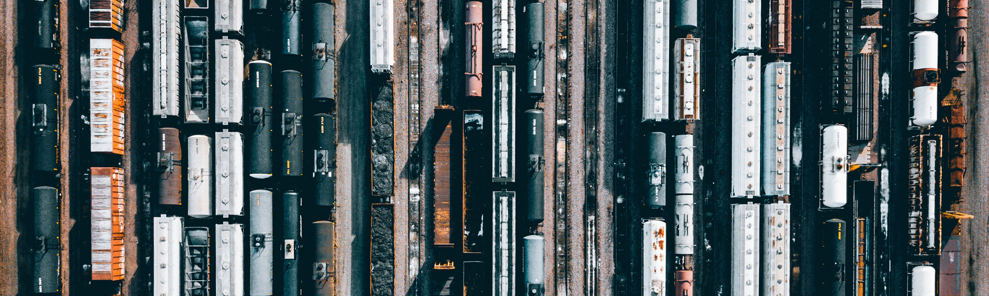 Railways with freight Photo by Campbell Boulanger on Unsplash
