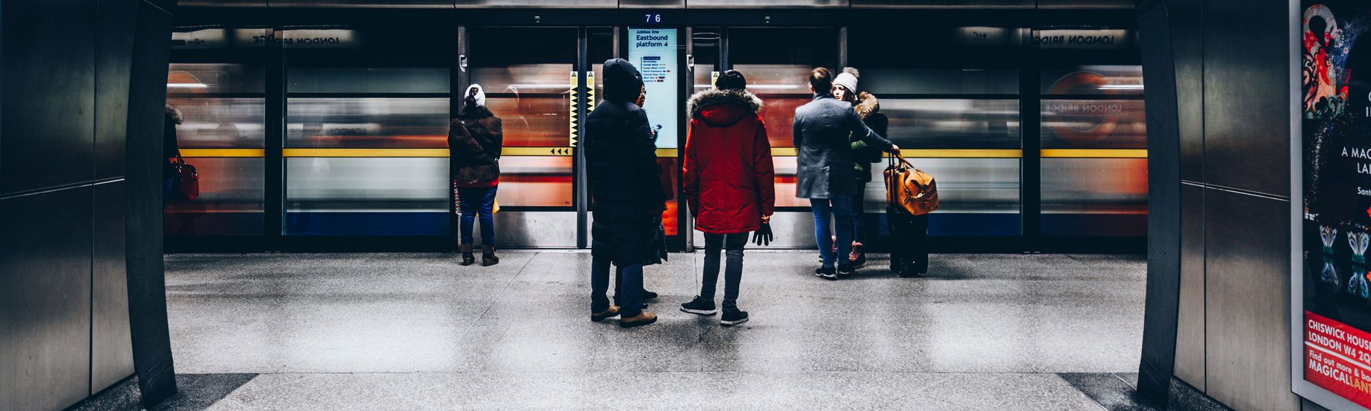 Passengers on London tube Photo by Christopher Burns on Unsplash
