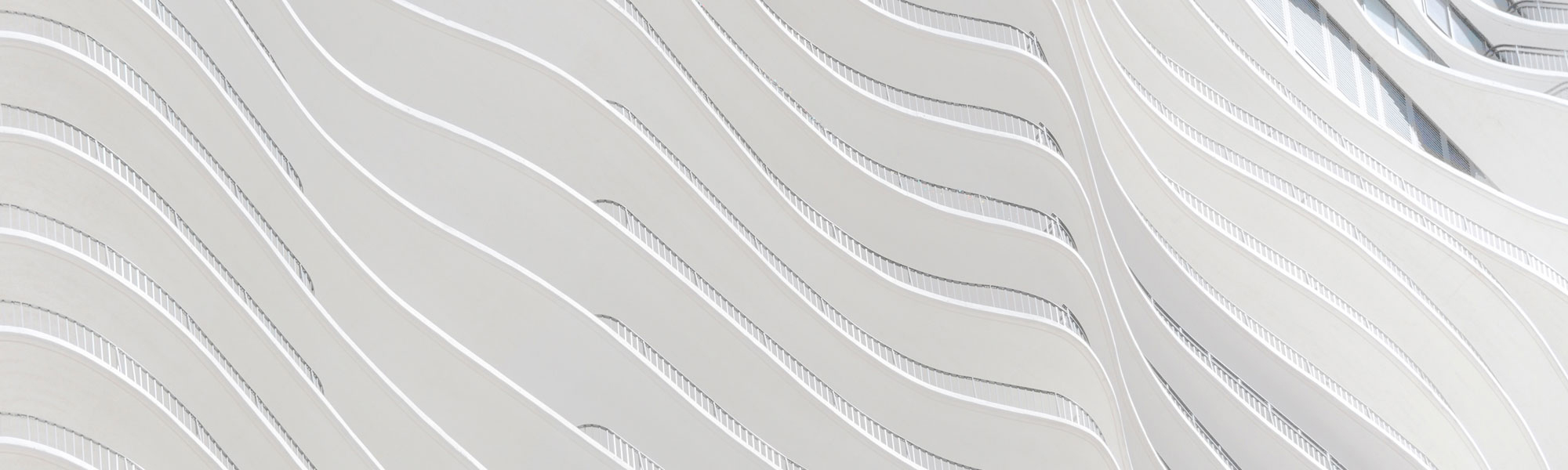 White wavy concrete Photo by Christian Perner on Unsplash